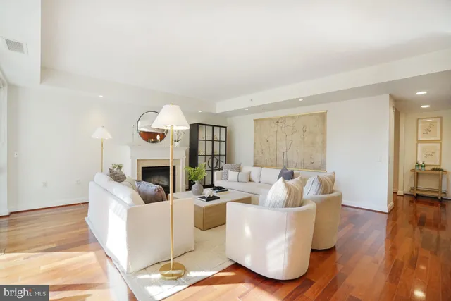 a bedroom with a bed and a table