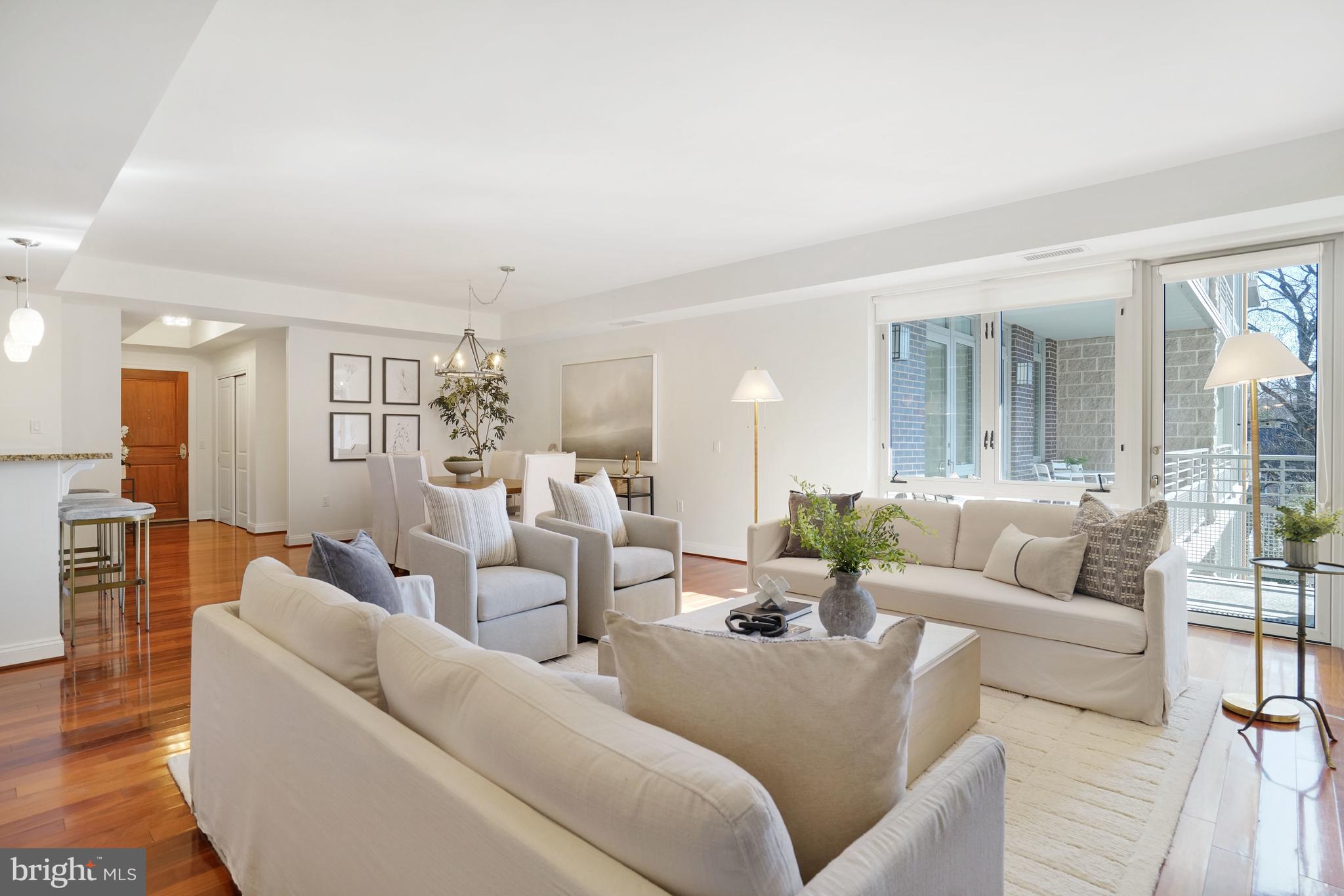 513 West Broad Street, Unit 510 Falls Church, VA 22046 - Photo 3 of 55 a living room with furniture and a large window