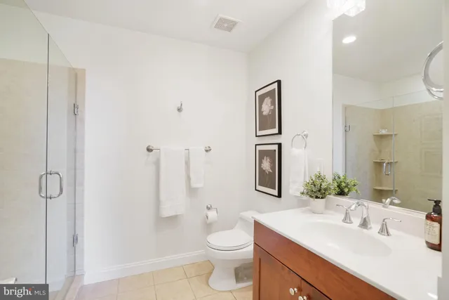 a view of storage and utility room with washer and dryer