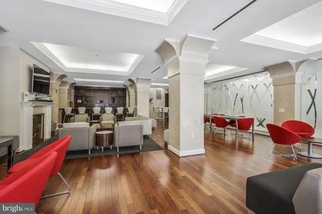 a view of house with swimming pool outdoor seating