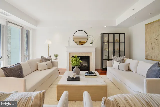 a living room with furniture or fireplace and a large window