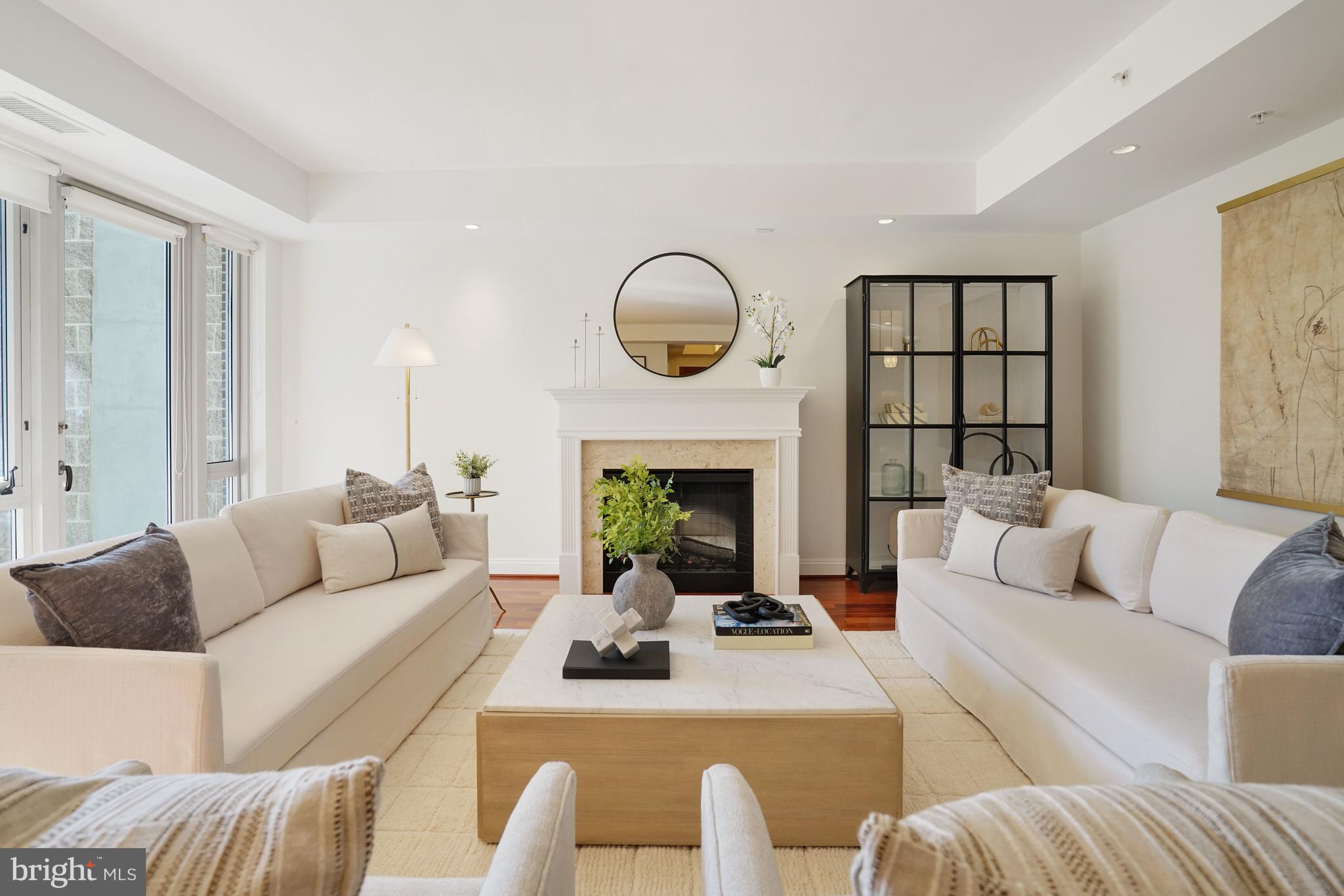 513 West Broad Street, Unit 510 Falls Church, VA 22046 - Photo 6 of 55 a living room with furniture or fireplace and a large window