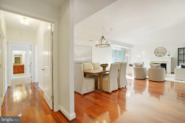 a view of living room with furniture and wooden floor