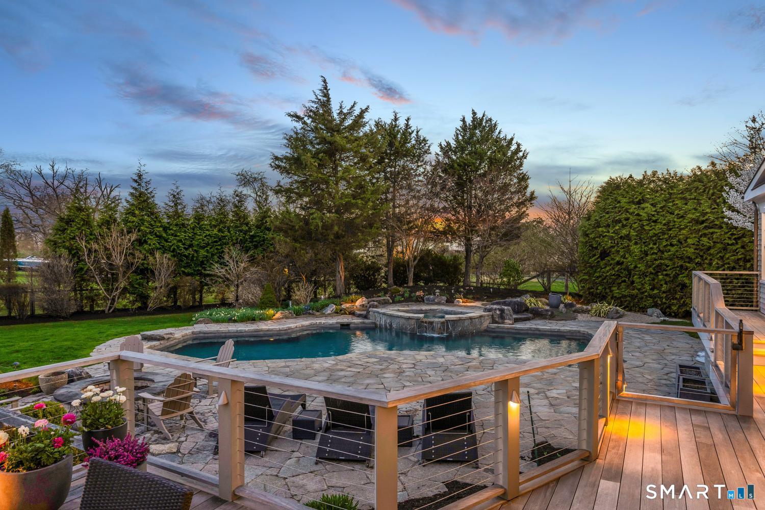30 Shipway Road Darien, CT 06820 - Photo 35 of 40 a view of a backyard with sitting area
