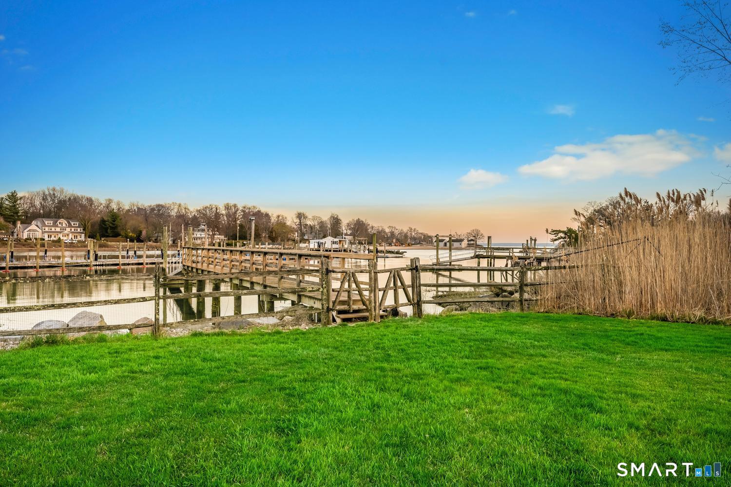 30 Shipway Road Darien, CT 06820 - Photo 37 of 40 a view of a lake with houses with outdoor space