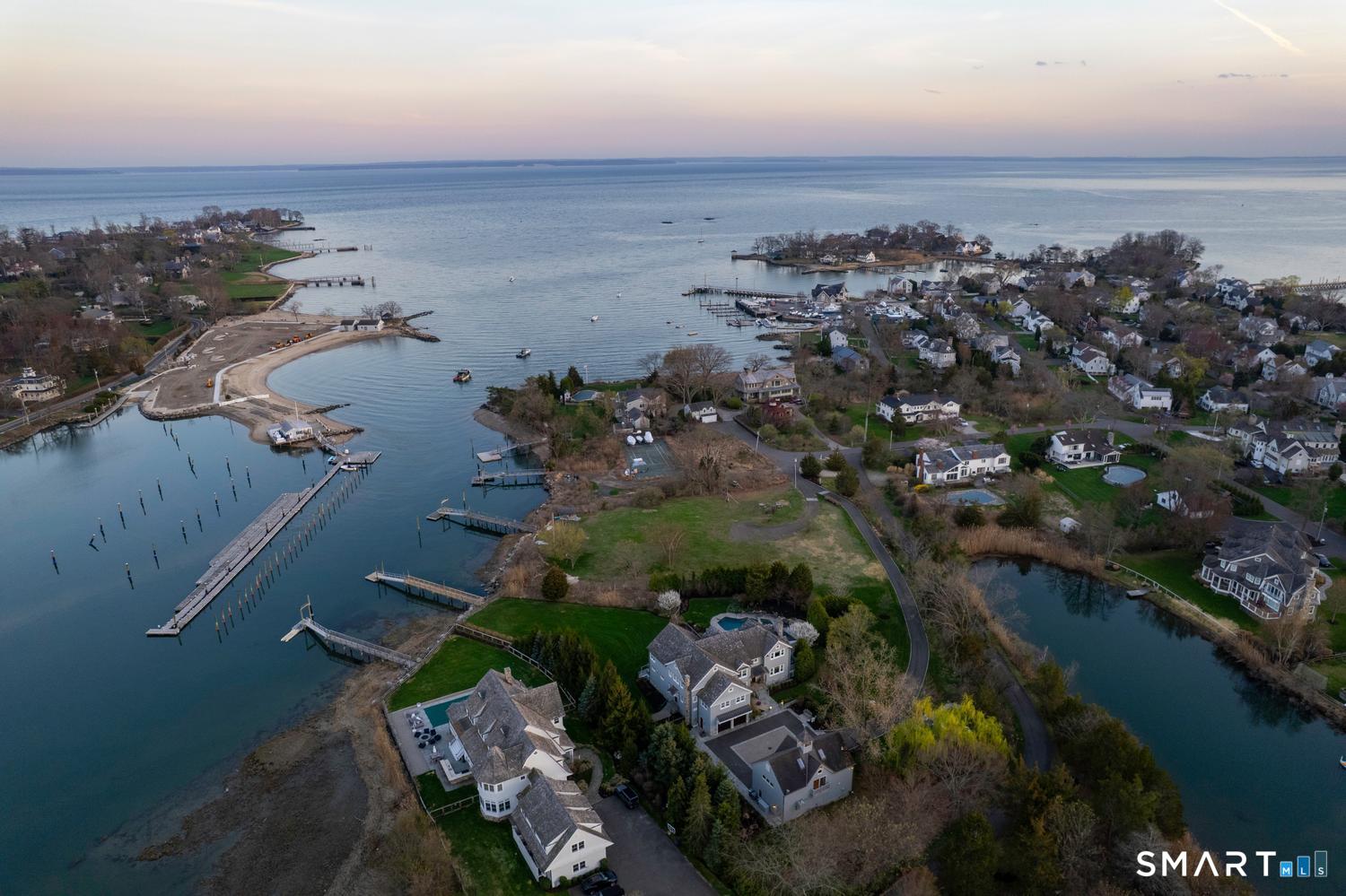 30 Shipway Road Darien, CT 06820 - Photo 4 of 40 an aerial view of multiple house with a lake view
