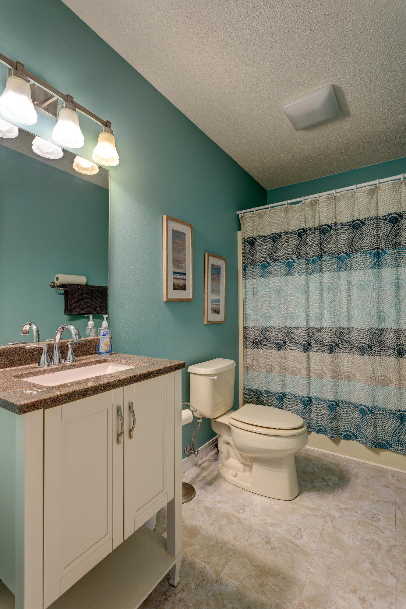 534 Ridge Lake Road Crestview, FL 32536 - Photo 54 of 61 a bathroom with a toilet sink and mirror