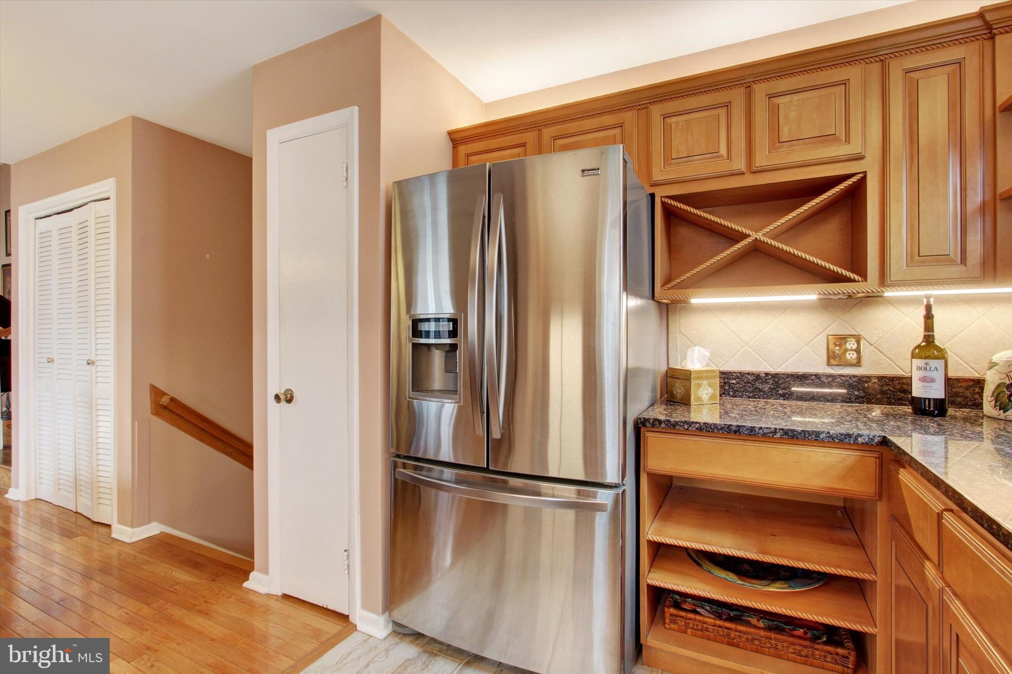 428 George Street Hanover, PA 17331 - Photo 15 of 43 a kitchen with a refrigerator a microwave and cabinets