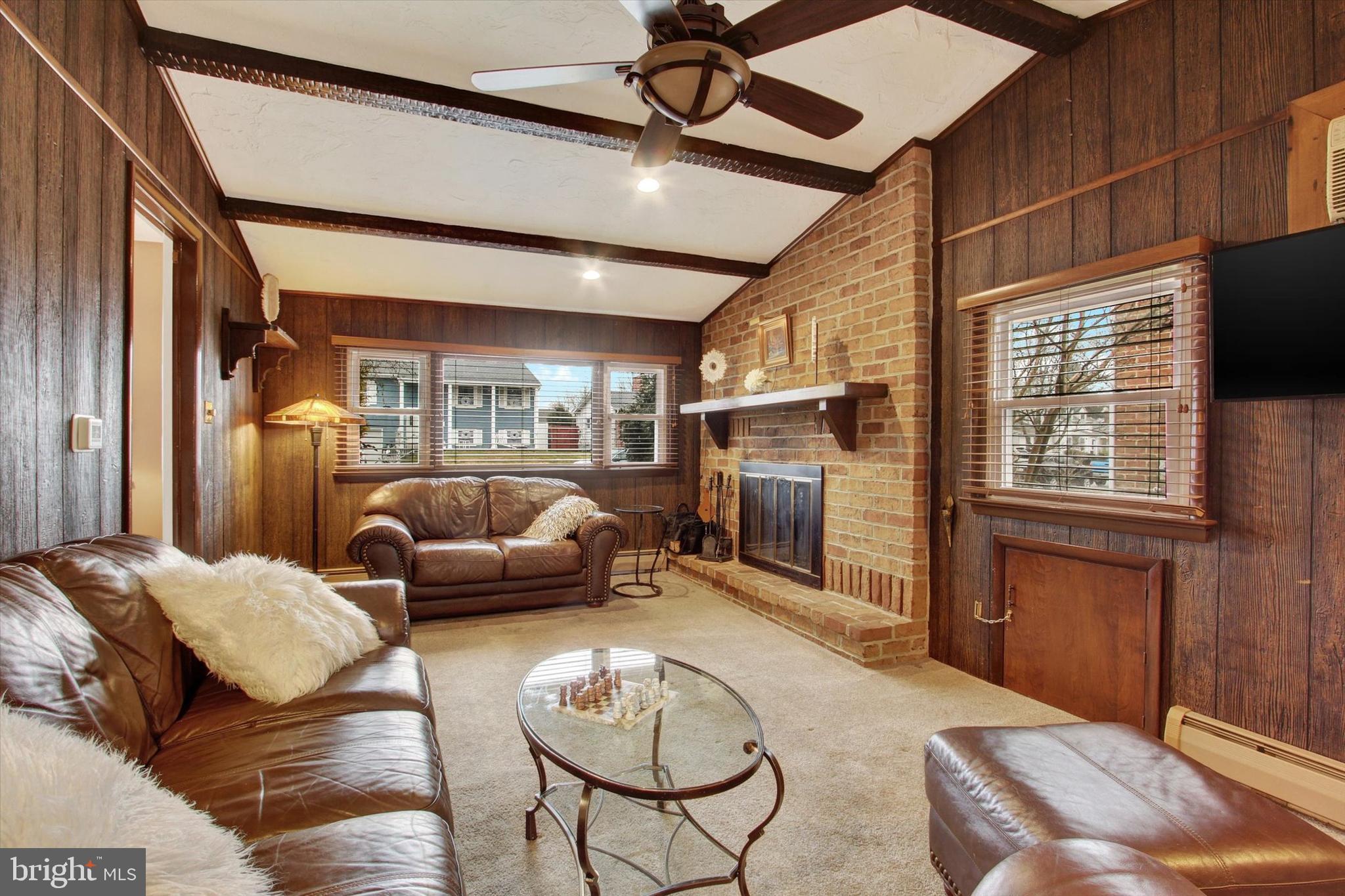 428 George Street Hanover, PA 17331 - Photo 19 of 43 a living room with furniture and a fireplace
