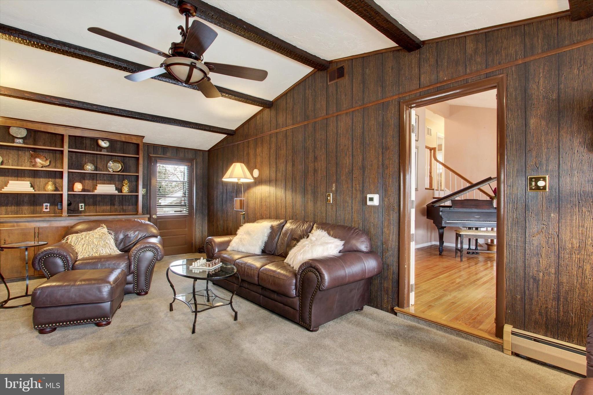 428 George Street Hanover, PA 17331 - Photo 21 of 43 a living room with furniture and a floor to ceiling window