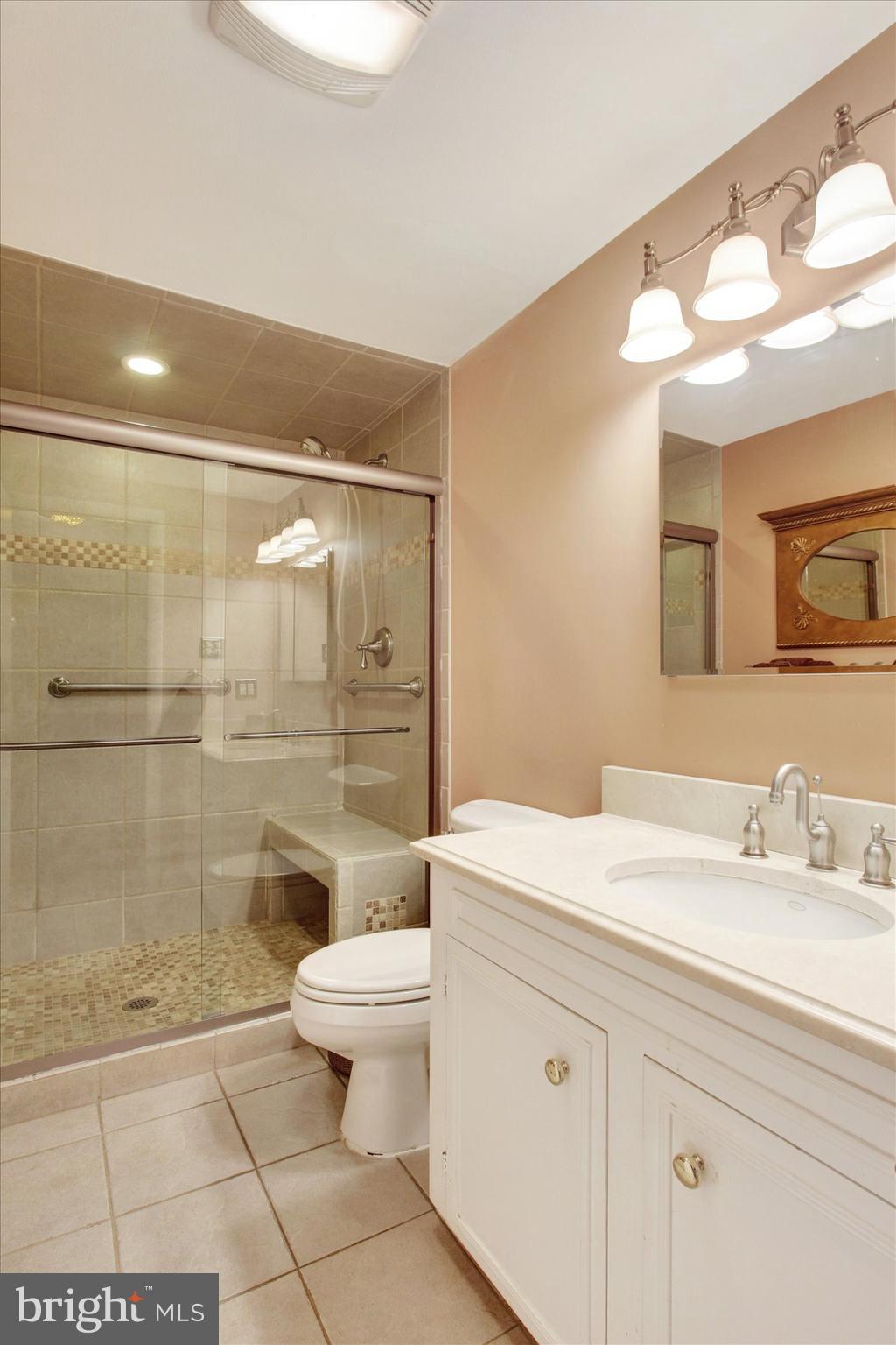 428 George Street Hanover, PA 17331 - Photo 23 of 43 a bathroom with a sink a toilet and shower