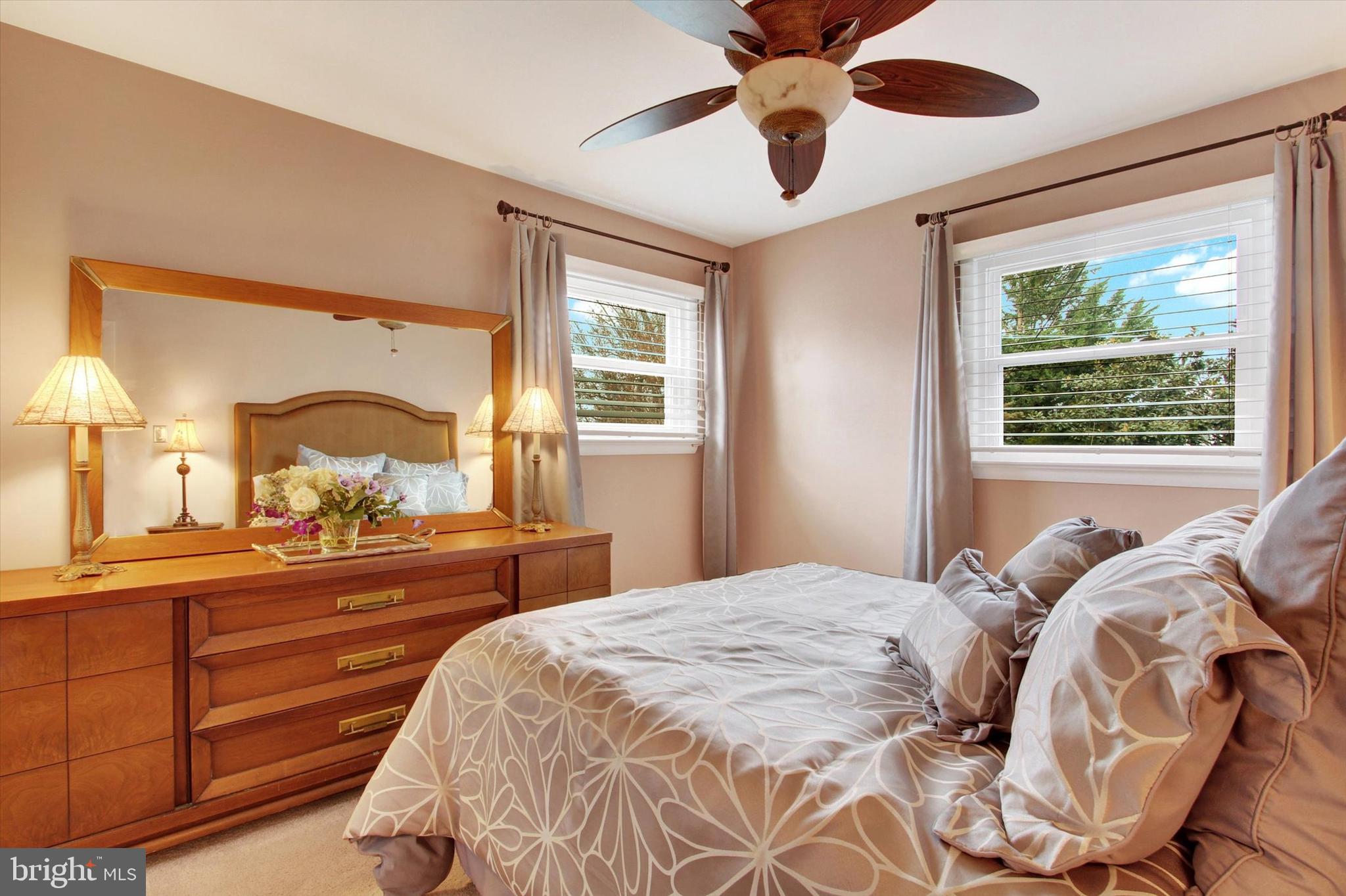 428 George Street Hanover, PA 17331 - Photo 25 of 43 a bedroom with a large bed and a chandelier