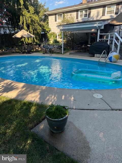 428 George Street Hanover, PA 17331 - Photo 3 of 43 a view of a backyard with plants and patio