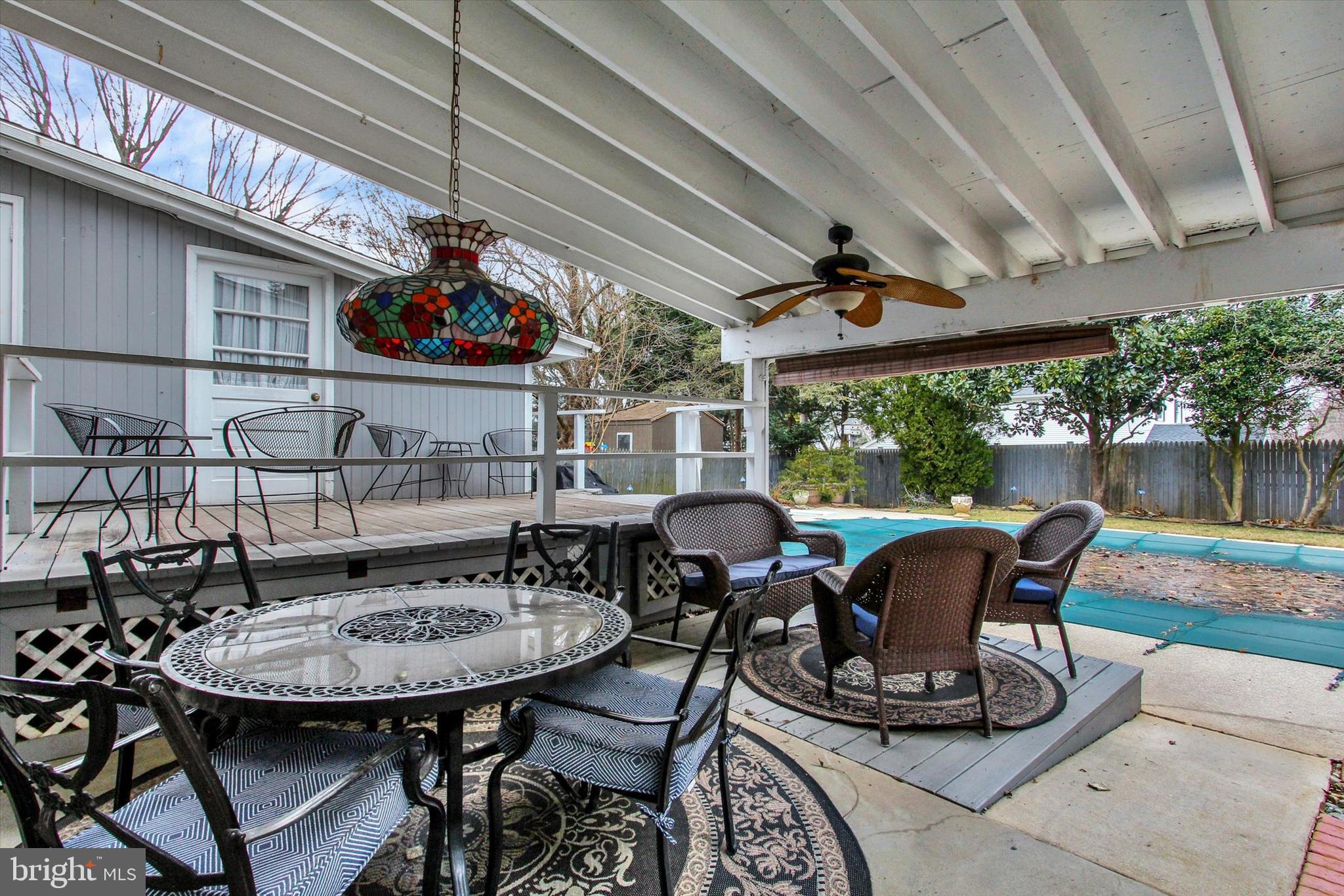 428 George Street Hanover, PA 17331 - Photo 34 of 43 a view of a patio with table and chairs a barbeque with wooden floor and a barbeque