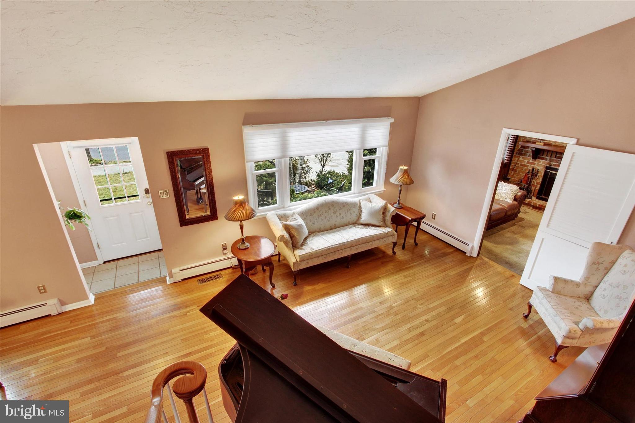 428 George Street Hanover, PA 17331 - Photo 8 of 43 a living room with furniture and a wooden floor
