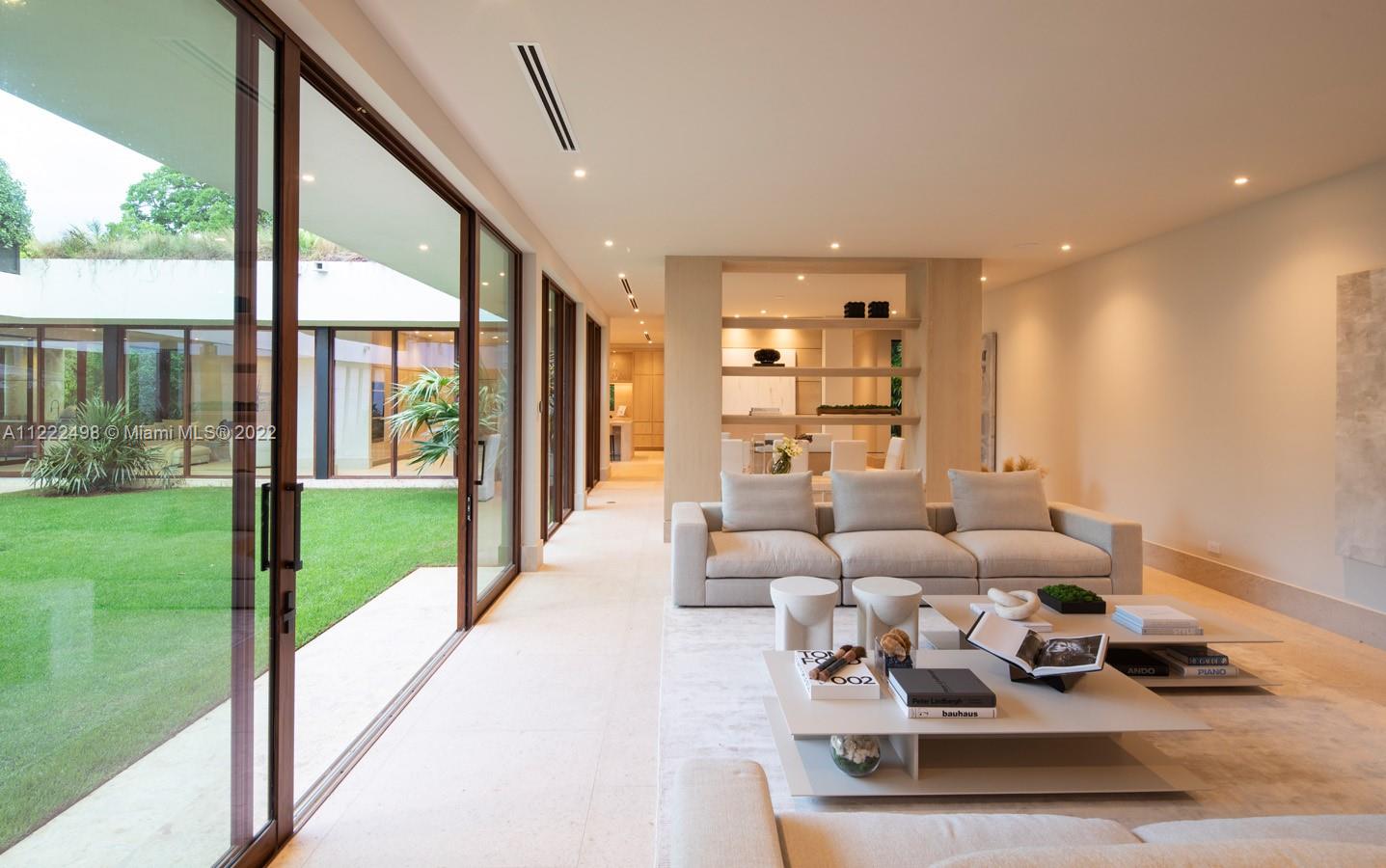 4550 Bay Point Road Miami, FL 33137 - Photo 18 of 92 a living room with furniture and a large window