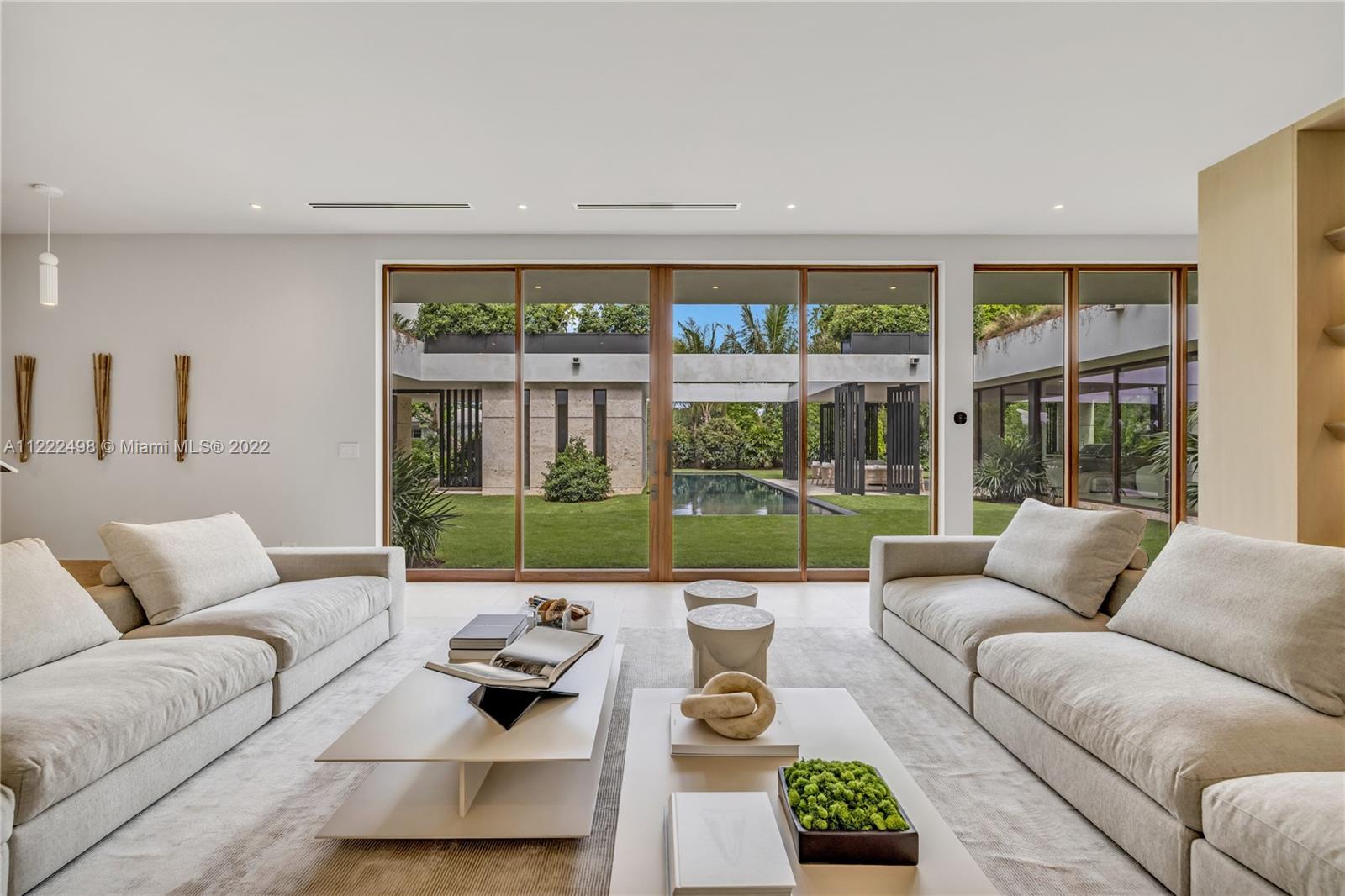 4550 Bay Point Road Miami, FL 33137 - Photo 19 of 92 a living room with furniture and a large window