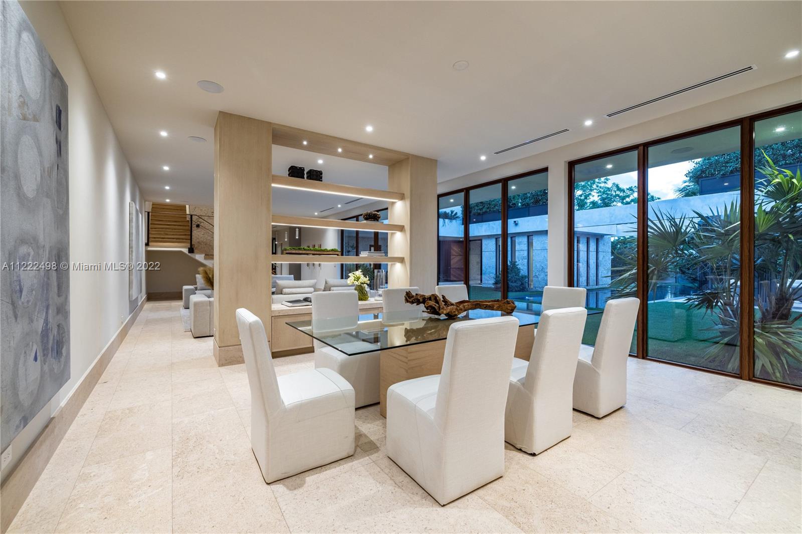 4550 Bay Point Road Miami, FL 33137 - Photo 26 of 92 a living room with fireplace furniture and a large window