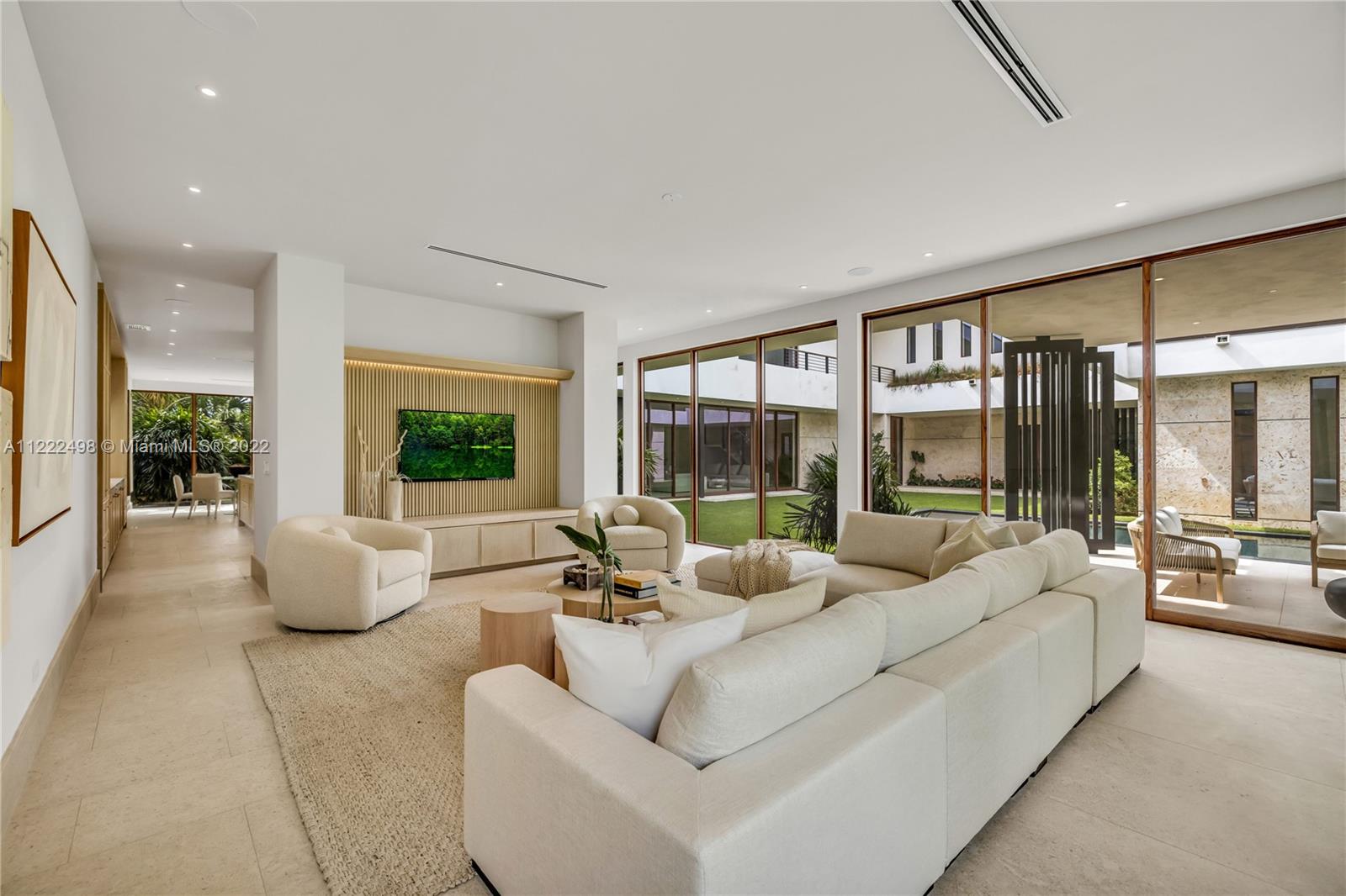 4550 Bay Point Road Miami, FL 33137 - Photo 37 of 92 a living room with furniture and a large window