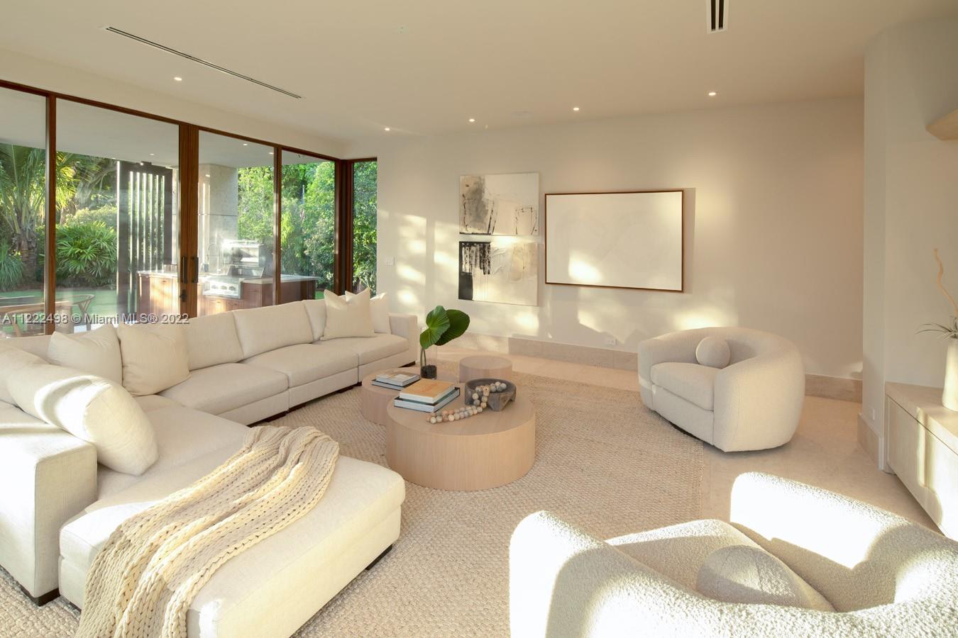 4550 Bay Point Road Miami, FL 33137 - Photo 38 of 92 a living room with furniture and a large window