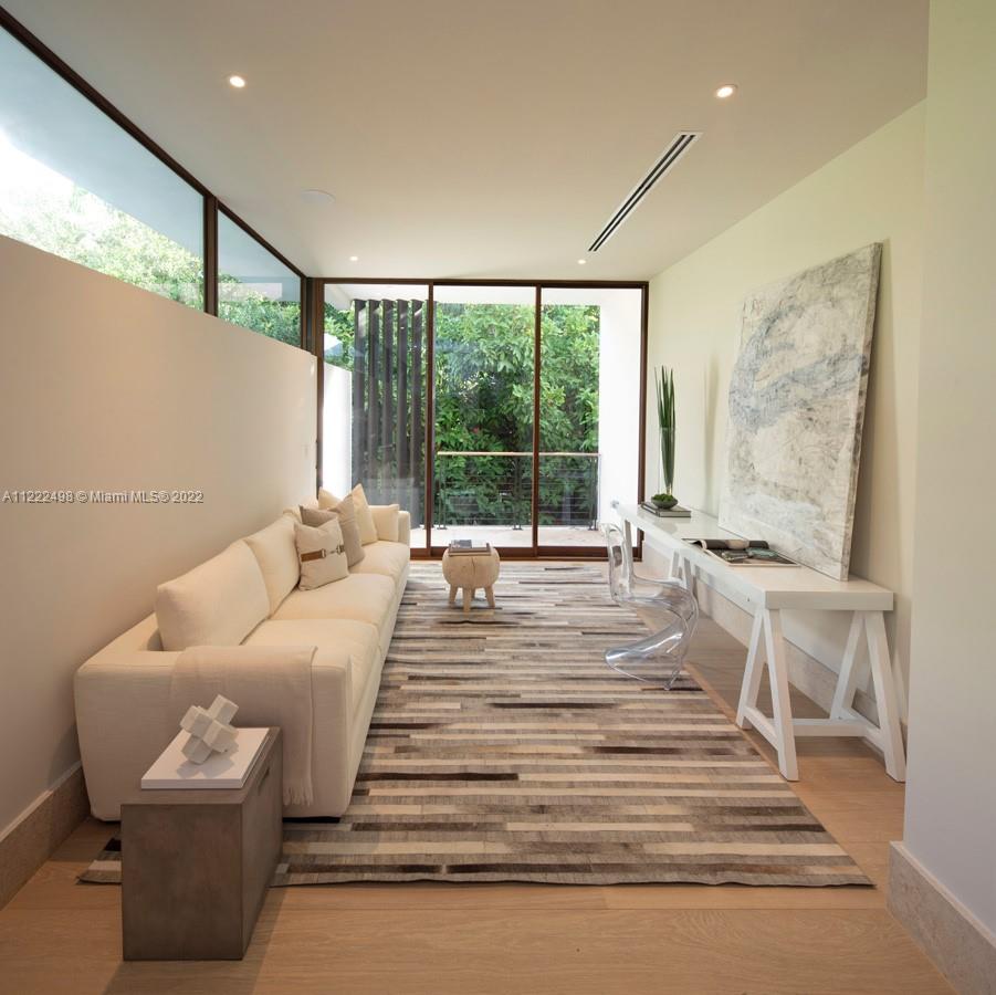 4550 Bay Point Road Miami, FL 33137 - Photo 52 of 92 a living room with furniture and a large window