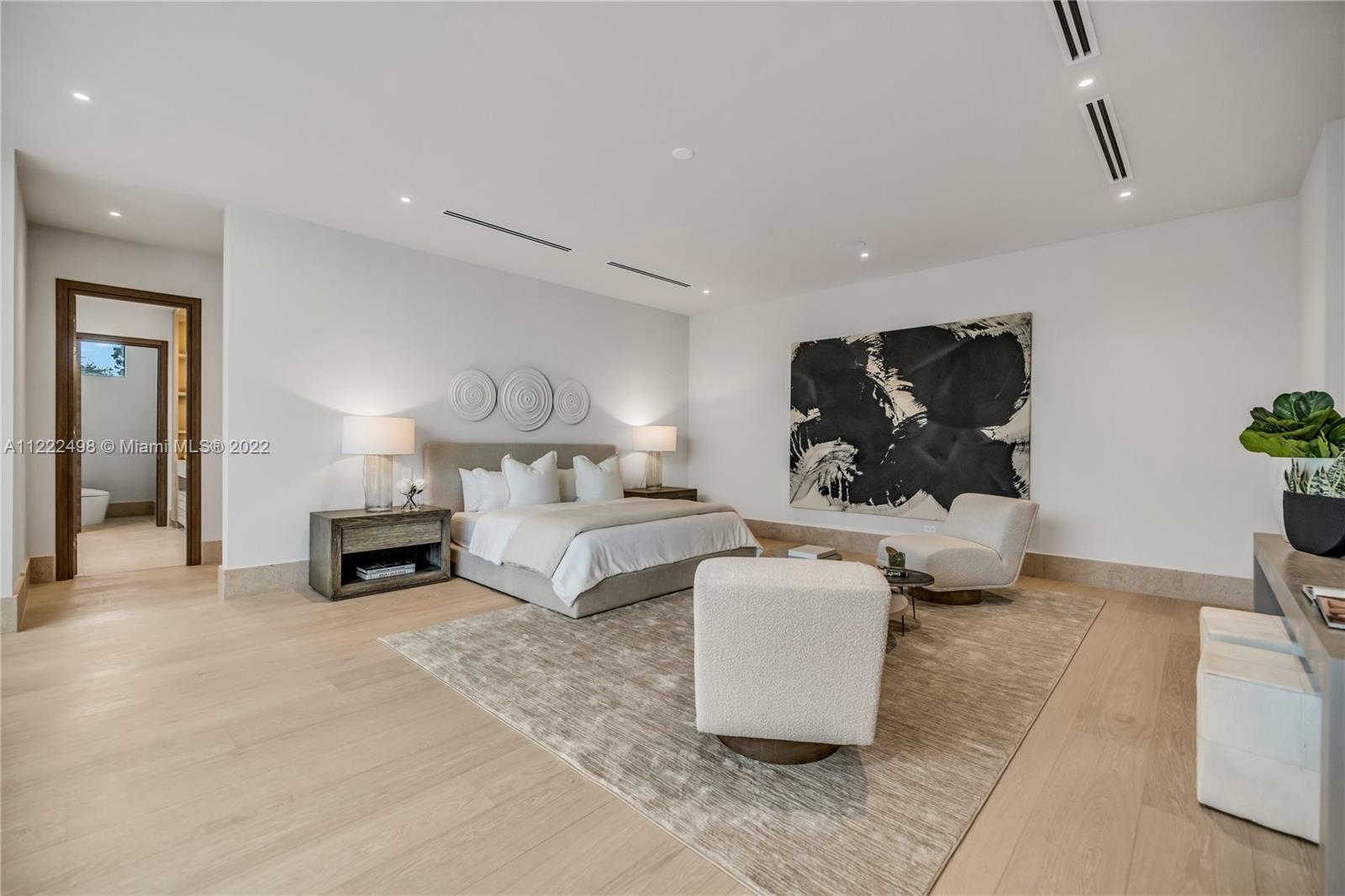 4550 Bay Point Road Miami, FL 33137 - Photo 56 of 92 a living room with furniture and a lamp