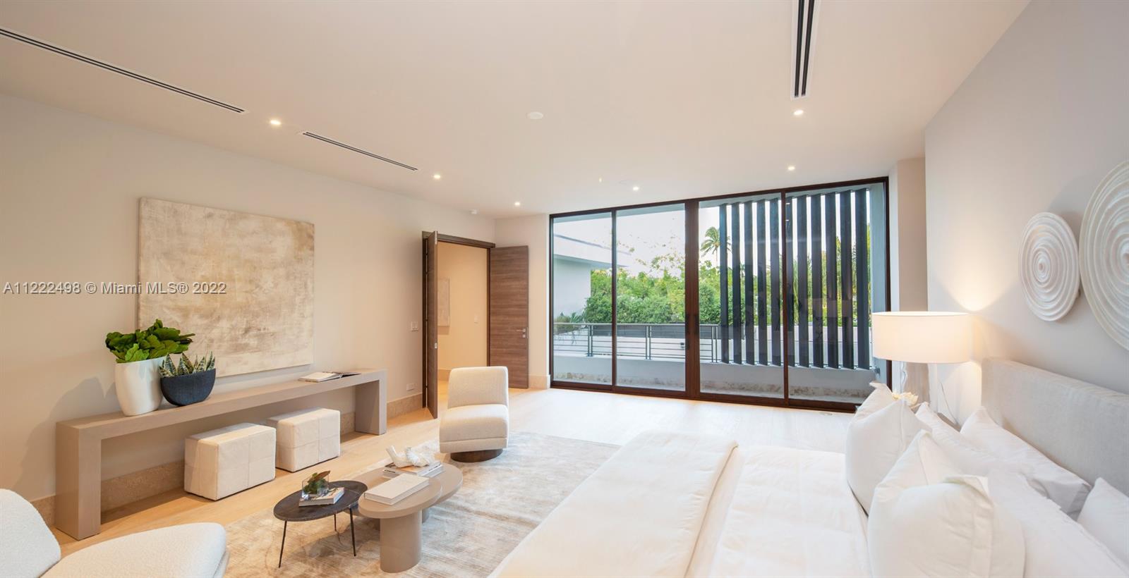 4550 Bay Point Road Miami, FL 33137 - Photo 60 of 92 a living room with furniture and a potted plant