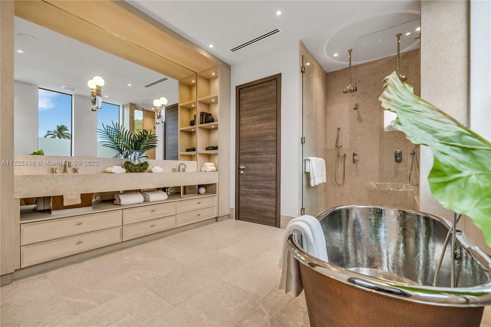 4550 Bay Point Road Miami, FL 33137 - Photo 61 of 92 a view of spacious bathroom with bathtub and shower