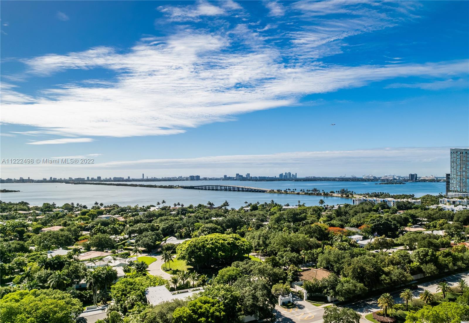 4550 Bay Point Road Miami, FL 33137 - Photo 77 of 92 a view of a yard with wooden floor