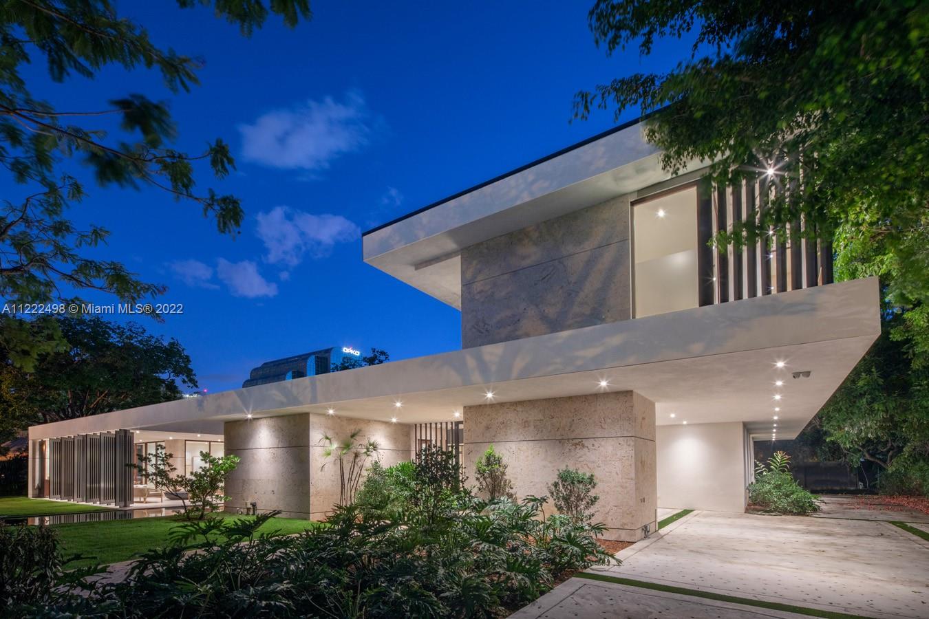 4550 Bay Point Road Miami, FL 33137 - Photo 84 of 92 a view of a house with a yard