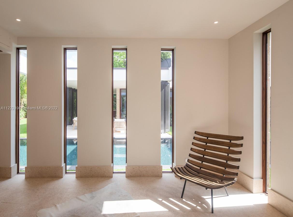 4550 Bay Point Road Miami, FL 33137 - Photo 88 of 92 a view of wooden floor and windows in a room
