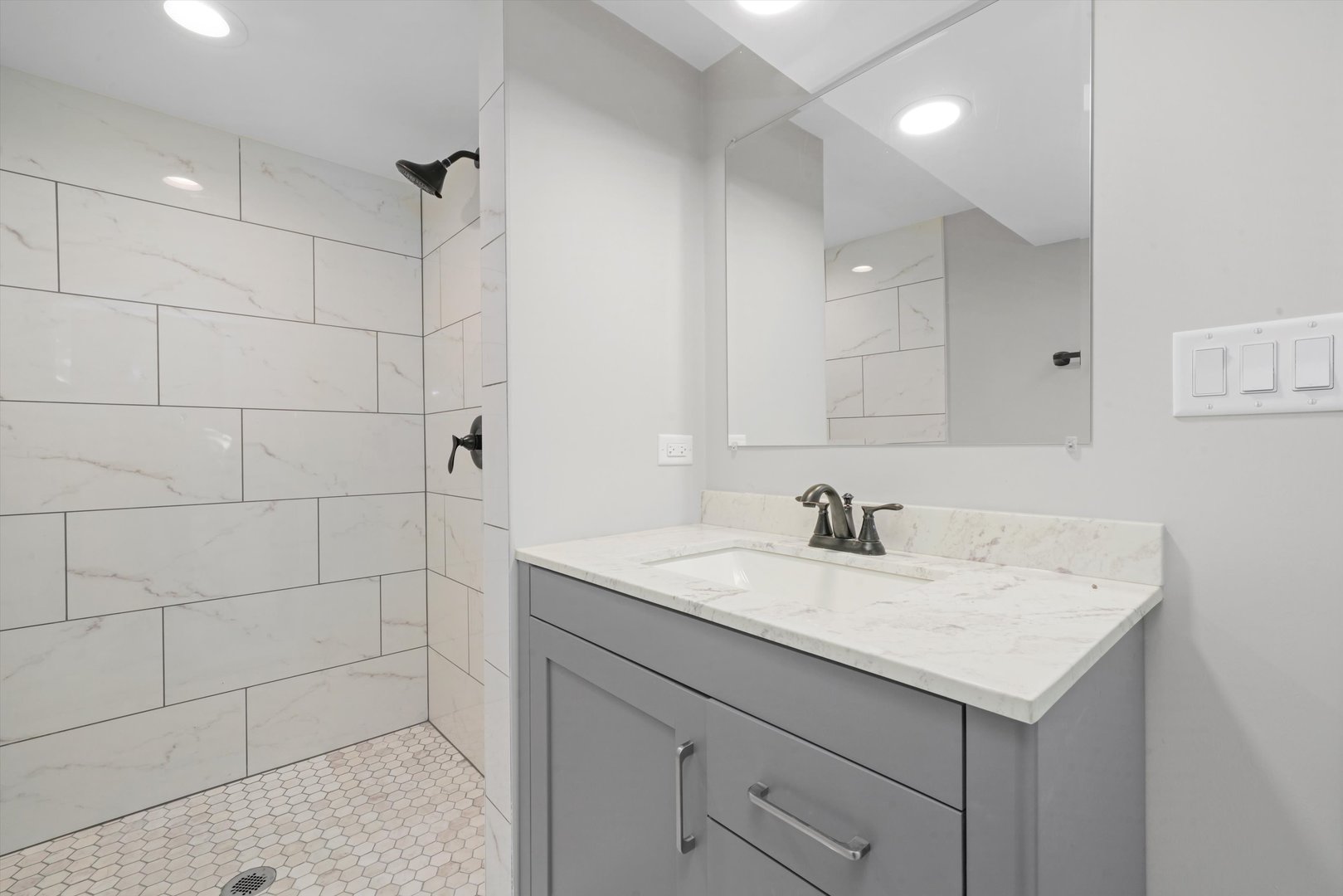 329 East Quincy Street Riverside, IL 60546 - Photo 27 of 39 a bathroom with a sink and vanity