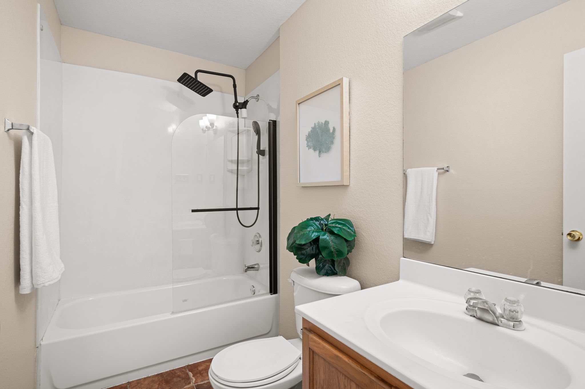 2321 Bendridge Trail Austin, TX 78744 - Photo 22 of 27 a bathroom with a granite countertop sink toilet and shower