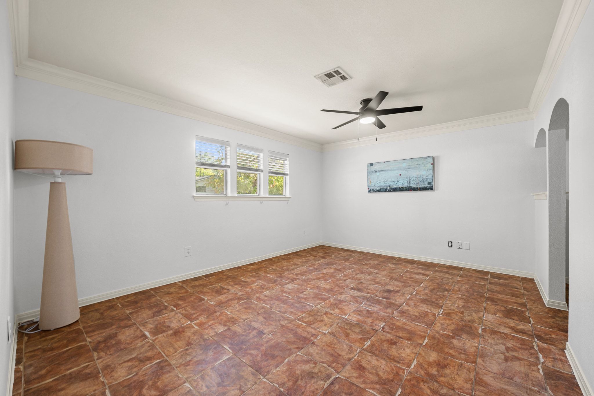 2321 Bendridge Trail Austin, TX 78744 - Photo 6 of 27 an empty room with fan and windows
