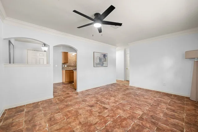 a view of a livingroom with a ceiling fan