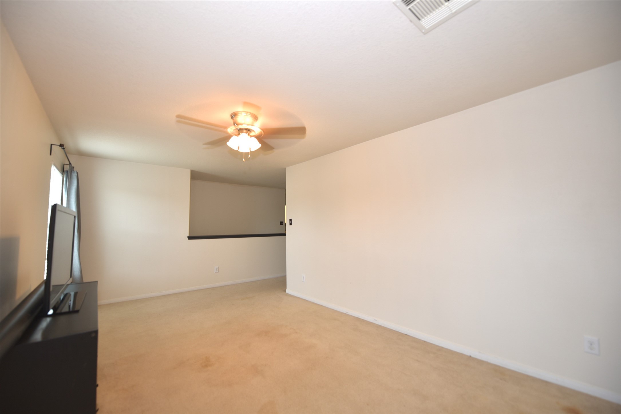 2719 Magnolia Hill Trail Houston, TX 77038 - Photo 12 of 28 a view of a livingroom with a chandelier fan