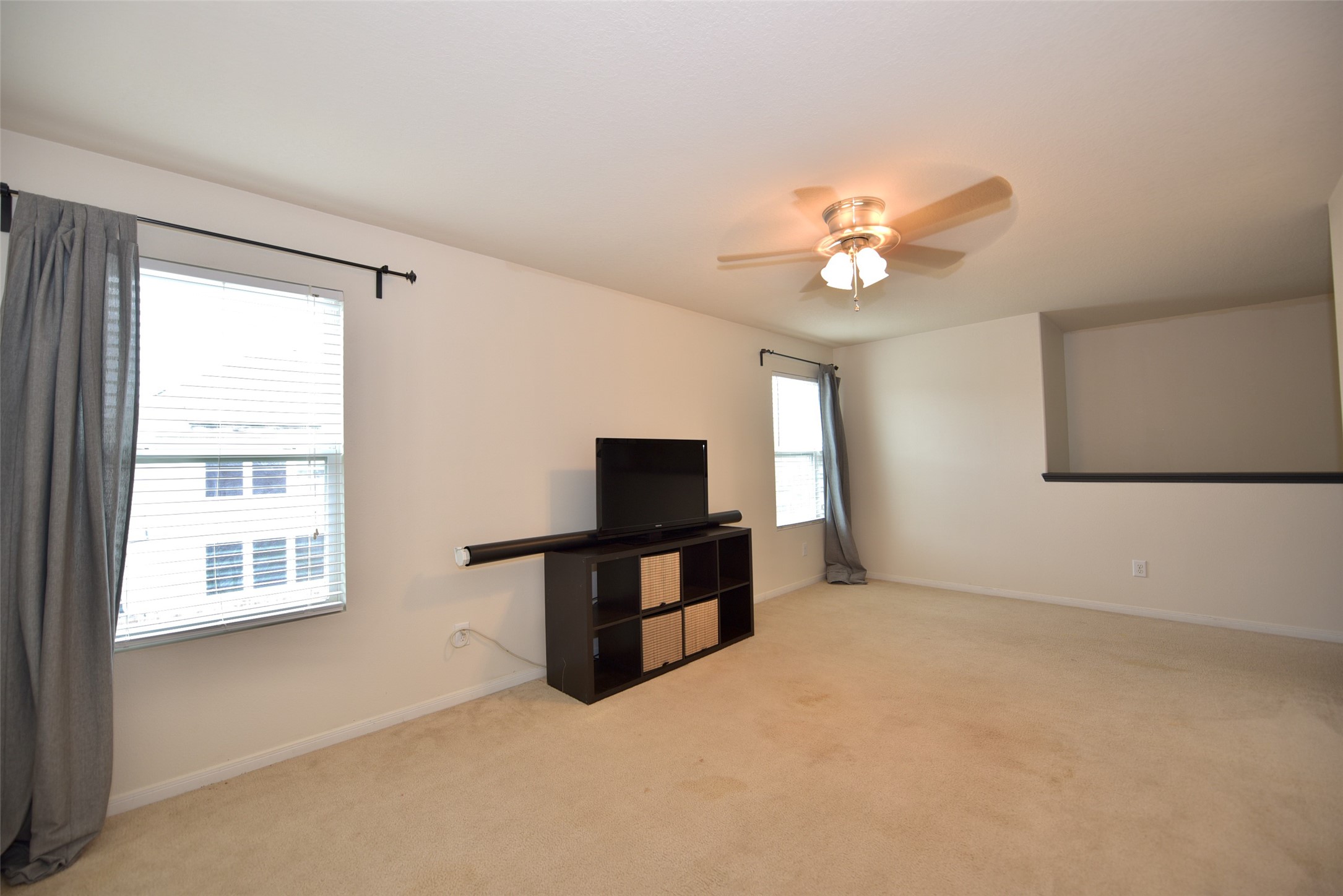 2719 Magnolia Hill Trail Houston, TX 77038 - Photo 13 of 28 a living room with furniture and a flat screen tv