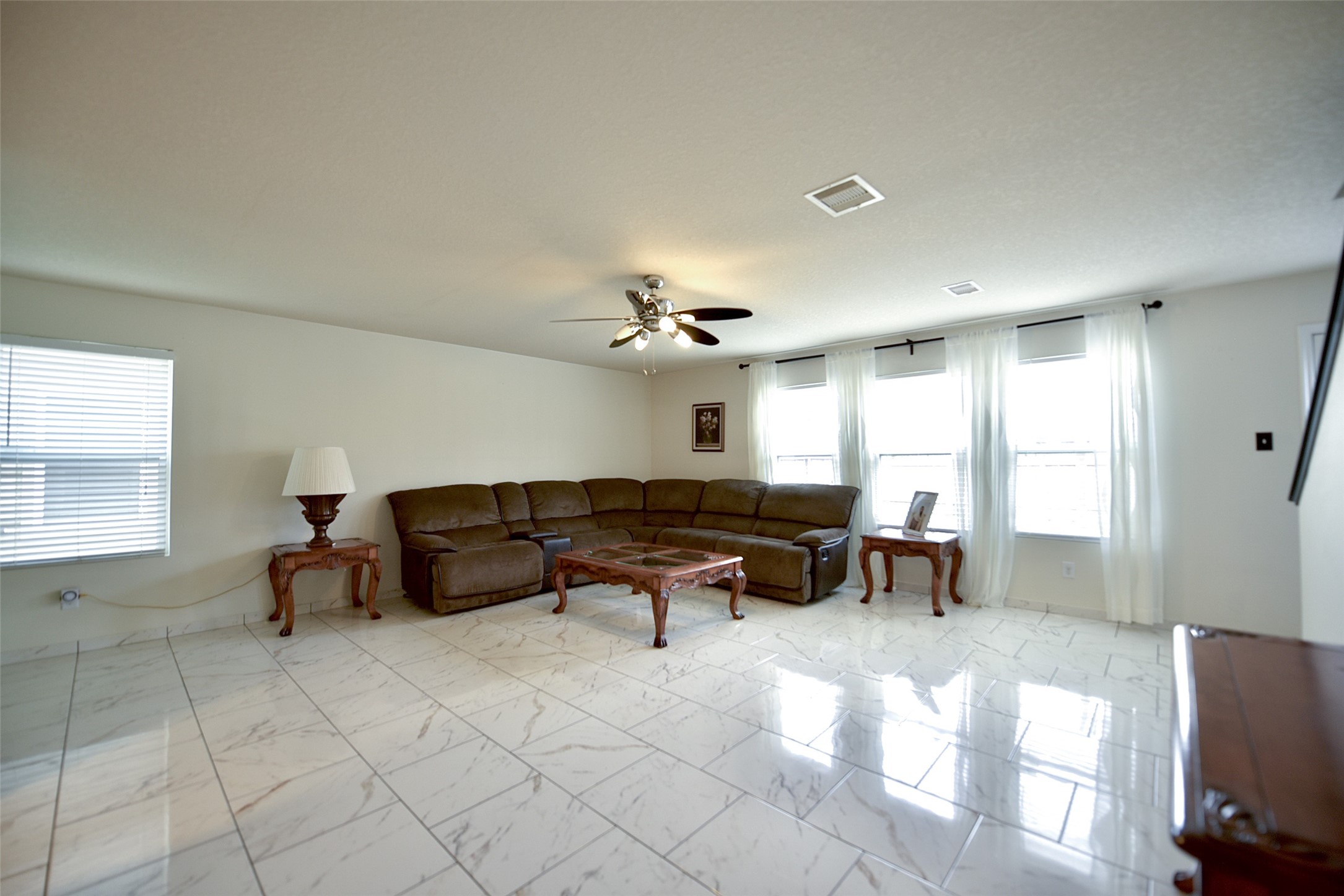 2719 Magnolia Hill Trail Houston, TX 77038 - Photo 17 of 28 a living room with furniture and a window