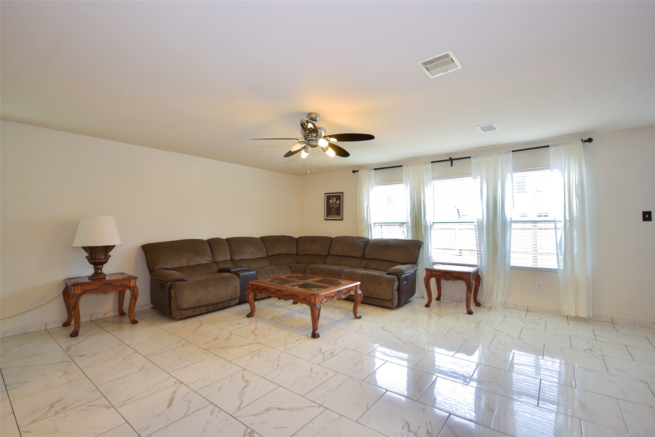 2719 Magnolia Hill Trail Houston, TX 77038 - Photo 22 of 28 a living room with furniture and a window