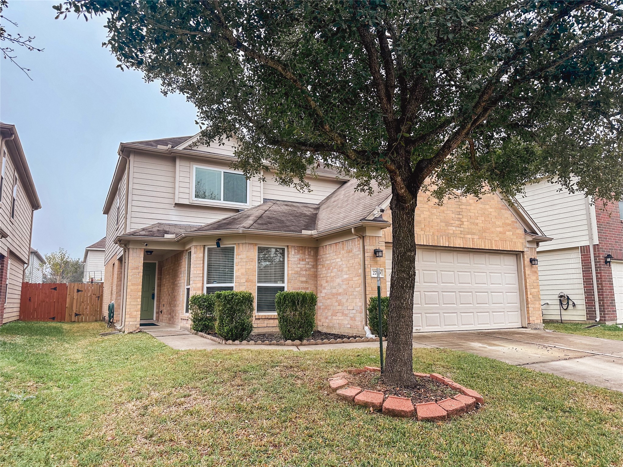 2719 Magnolia Hill Trail Houston, TX 77038 - Photo 3 of 28 a front view of house with a garden