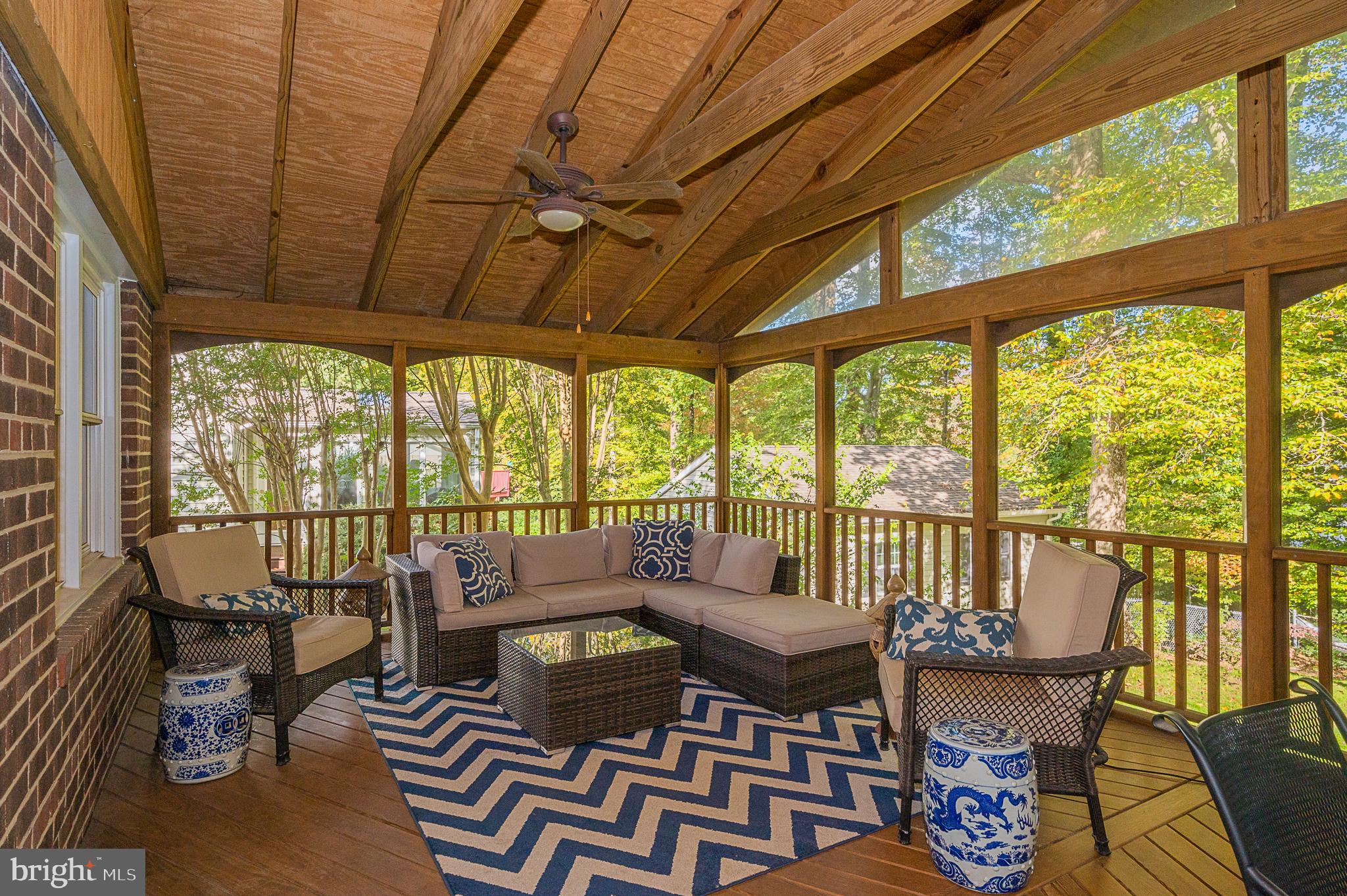 6701 Coachman Drive Springfield, VA 22152 - Photo 21 of 41 Screened-in porch with gas fireplace - What a View