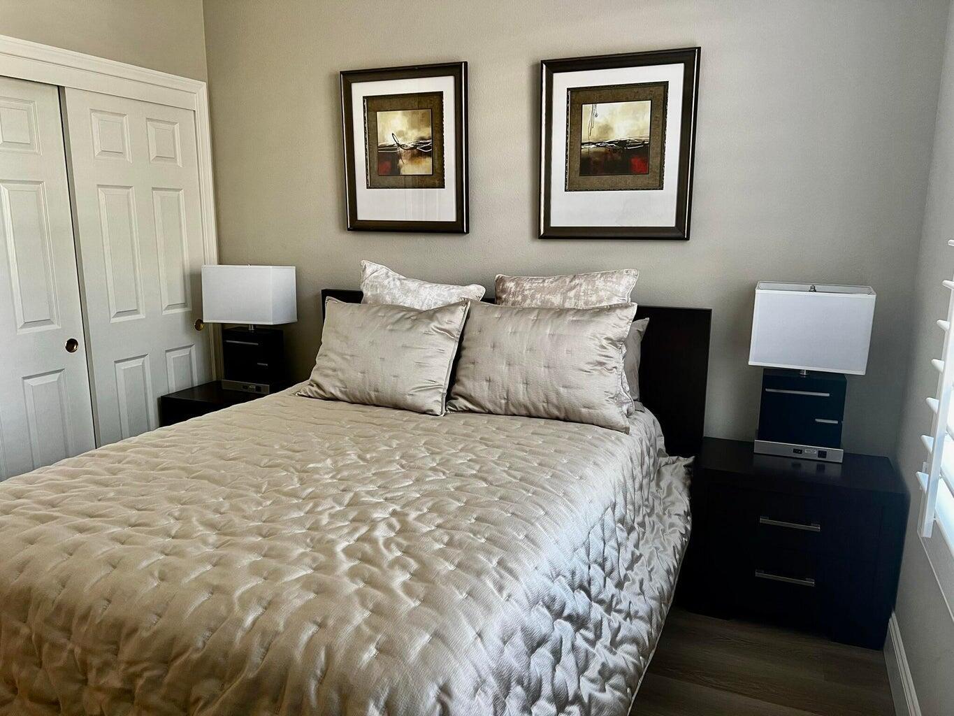 44725 Alexandria Vale Indio, CA 92201 - Photo 15 of 22 a bedroom with a bed and a view of kitchen