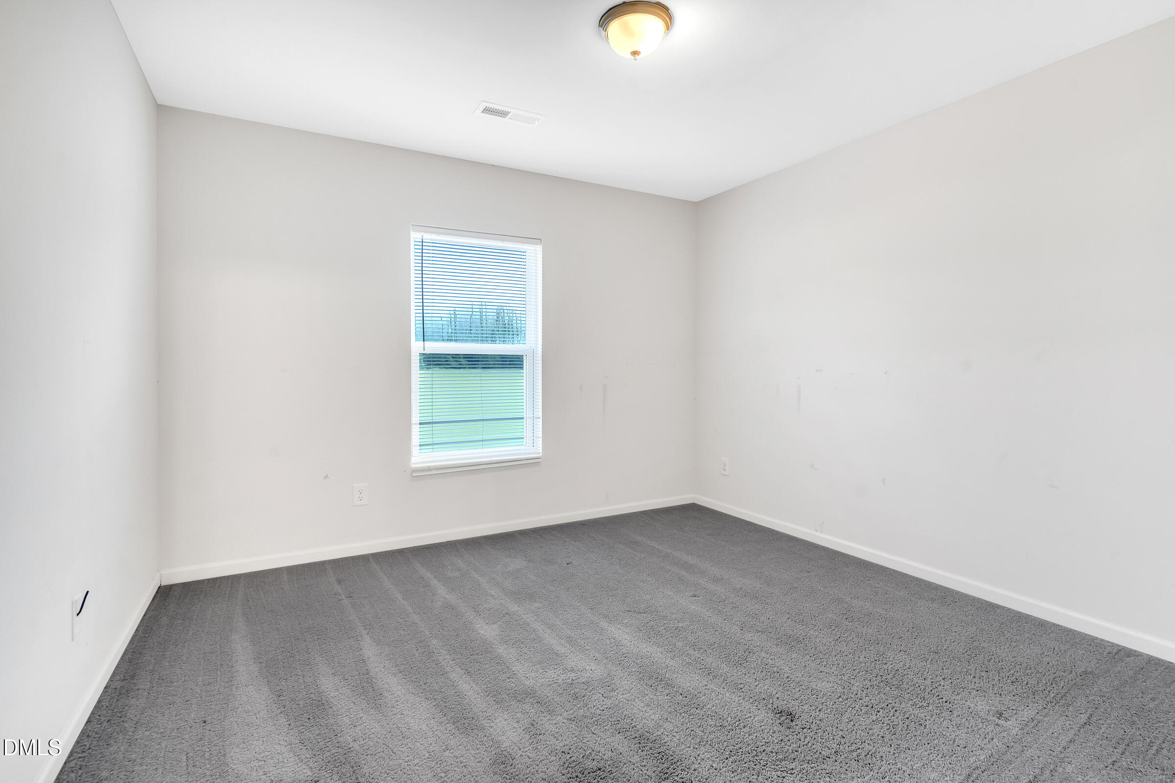 3146 Stoney Hill Church Road Bailey, NC 27807 - Photo 24 of 26 an empty room with windows