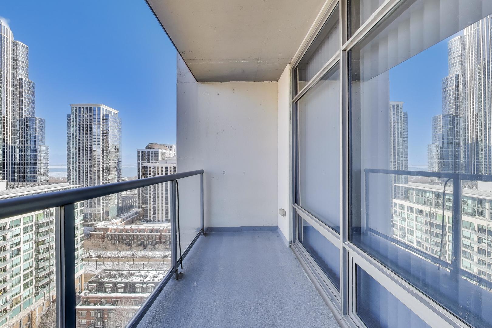 100 East 14th Street, Unit 2010 Chicago, IL 60605 - Photo 17 of 30 a view of balcony with wooden floor