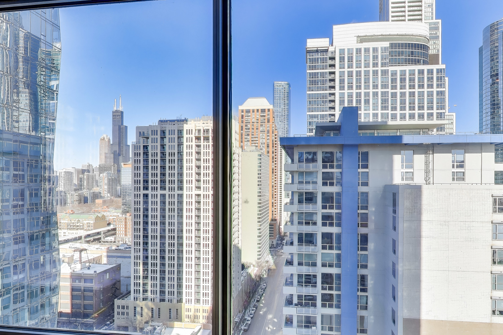 100 East 14th Street, Unit 2010 Chicago, IL 60605 - Photo 6 of 30 a front view of a building with a city view