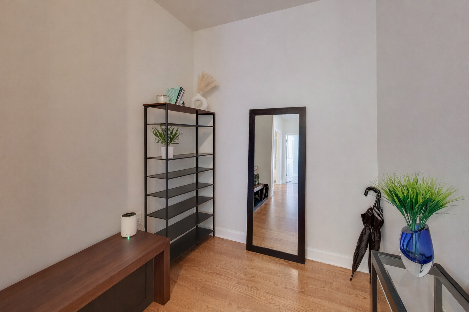 100 East 14th Street, Unit 2010 Chicago, IL 60605 - Photo 10 of 30 a view of a room with wooden floor and small entryway