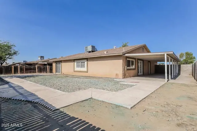 a front view of a house with a garage