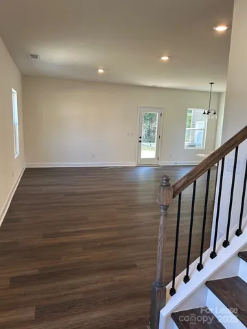 a view of entryway with wooden floor
