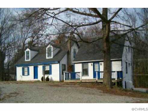 2215 Batterson Road Powhatan, VA 23139 - Photo 1 of 1 a front view of a house with a yard