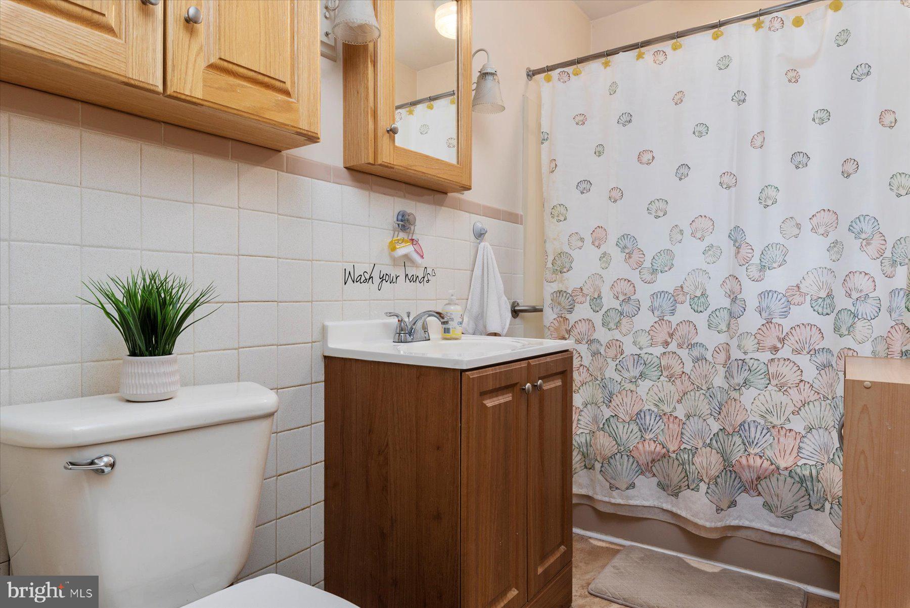867 Woods Road Pasadena, MD 21122 - Photo 14 of 23 Full Bath 1st Level